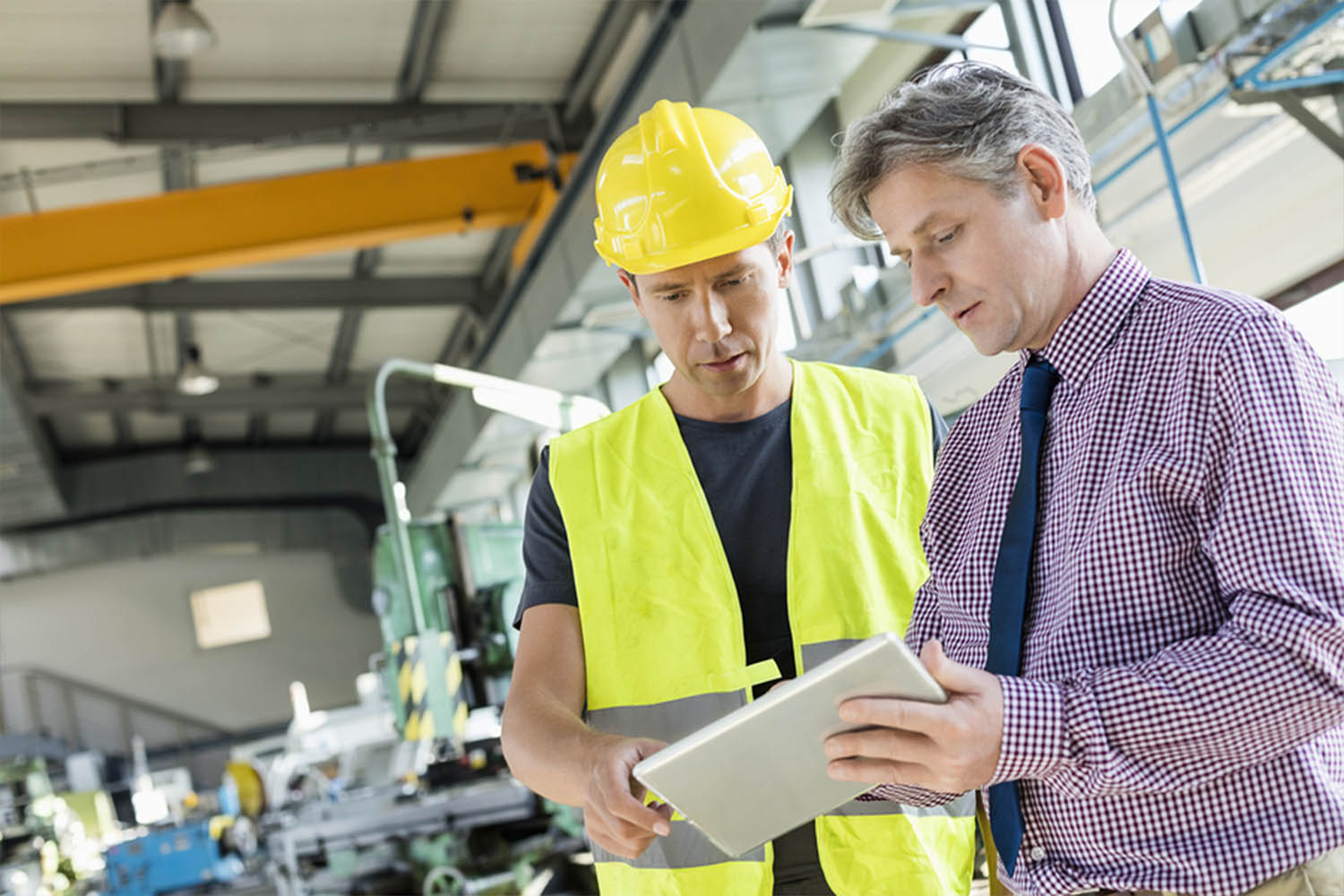 Industrial workers talking